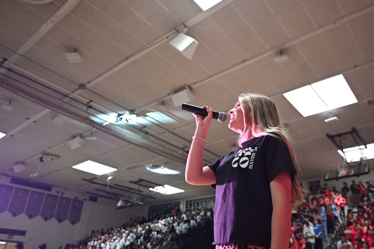 Senior Josie Tolson opens the 2024 Homecoming Pep Rally with her rendition of ABBA's 'Dancing Queen'.